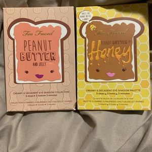 Two too faced palettes and a makeup bag